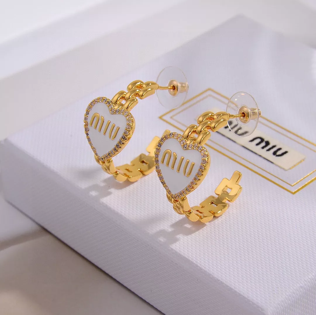 miu miu boucles doreilles pour femme s_12706a2